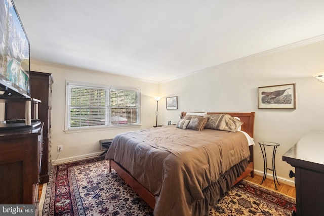 1219 Potomac School Rd, Mclean, VA 22101 - bedroom with crown molding, baseboards, and wood finished floors