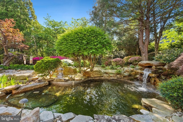 1219 Potomac School Rd, Mclean, VA 22101 - view of yard with a small pond