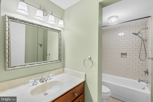 full bathroom featuring vanity, bathing tub / shower combination, and toilet