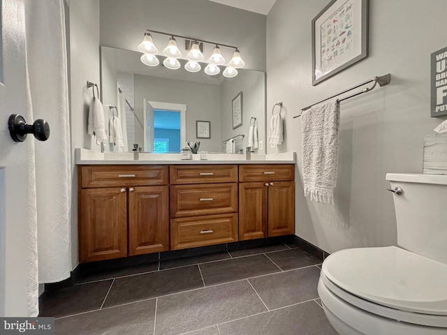 1351 Matthew Dr, Huntingtown, MD 20639 - bathroom featuring toilet, tile patterned floors, and double vanity