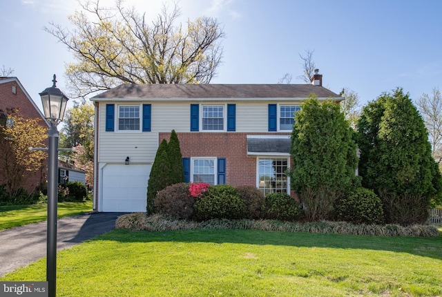 3004 Joshua Rd, Lafayette Hill, PA 19444 - view of front of property with a garage, a chimney, driveway, and a front yard