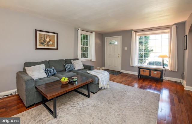 3004 Joshua Rd, Lafayette Hill, PA 19444 - living room featuring baseboards and dark wood-style flooring
