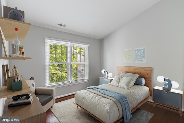 5811 Summerlake Way, Centreville, VA 20120 - bedroom with wood-type flooring, baseboards, visible vents, and vaulted ceiling