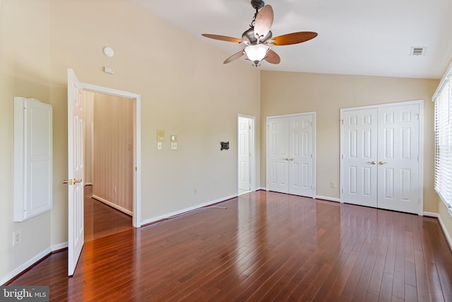 5811 Summerlake Way, Centreville, VA 20120 - unfurnished bedroom featuring visible vents, two closets, high vaulted ceiling, and wood finished floors