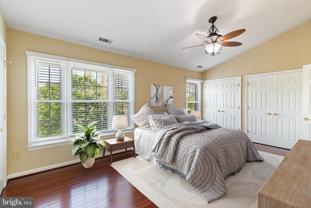 5811 Summerlake Way, Centreville, VA 20120 - bedroom with multiple closets, visible vents, multiple windows, and hardwood / wood-style floors