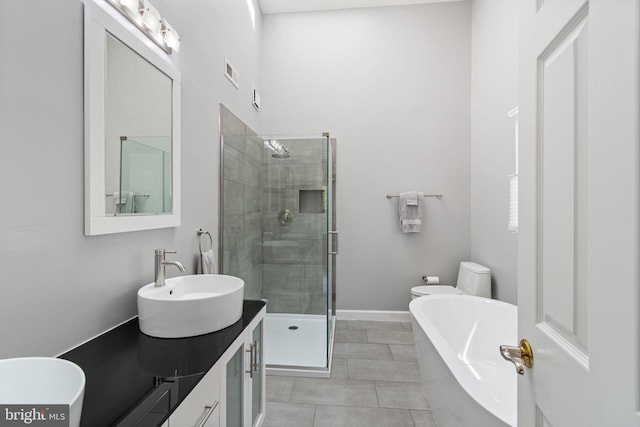5811 Summerlake Way, Centreville, VA 20120 - bathroom with visible vents, vanity, a stall shower, and a soaking tub