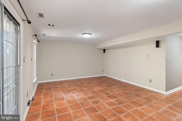 5811 Summerlake Way, Centreville, VA 20120 - basement featuring visible vents, baseboards, and light tile patterned floors
