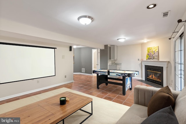5811 Summerlake Way, Centreville, VA 20120 - recreation room with tile patterned floors, recessed lighting, baseboards, a fireplace with flush hearth, and visible vents