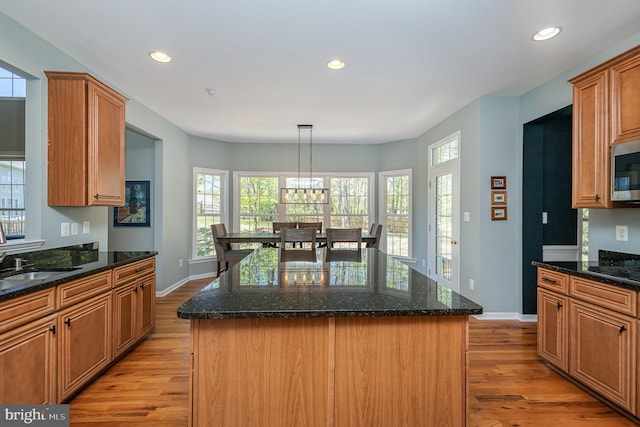 kitchen with recessed lighting and light wood-type flooring