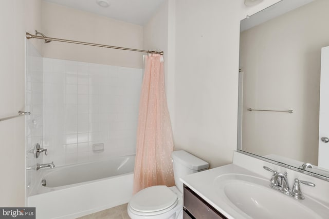 full bathroom featuring vanity, tile patterned floors, shower / bath combo, and toilet