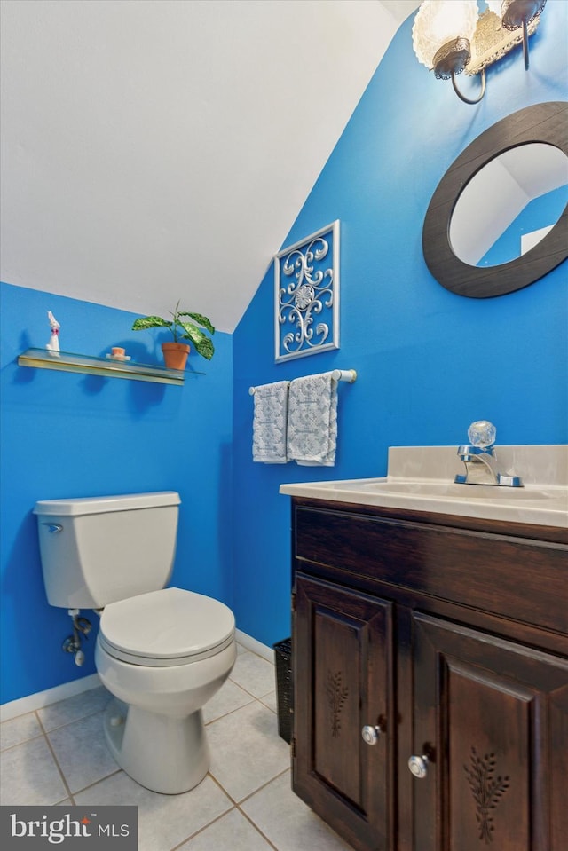 315 Waverly Rd, Southampton, PA 18966 - bathroom featuring vaulted ceiling, toilet, tile patterned floors, vanity, and baseboards