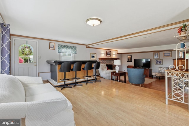 315 Waverly Rd, Southampton, PA 18966 - living room with wood finished floors, a fireplace, and crown molding