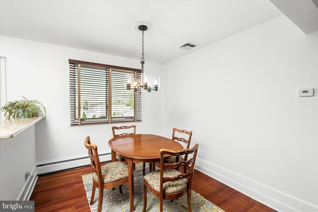 221 Orchard Ave, Burlington, NJ 08016 - dining space featuring an inviting chandelier, baseboards, a baseboard radiator, visible vents, and dark wood-style floors