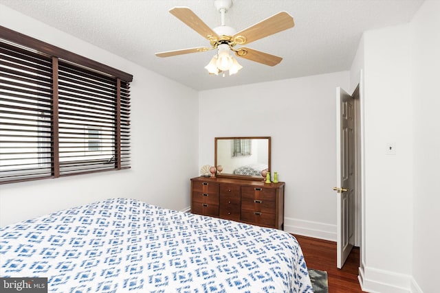 221 Orchard Ave, Burlington, NJ 08016 - bedroom with baseboards, a ceiling fan, and dark wood-type flooring