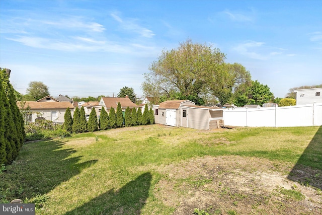 221 Orchard Ave, Burlington, NJ 08016 - view of yard featuring a storage shed, a residential view, fence, and an outbuilding