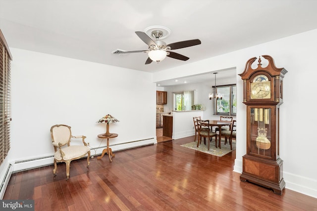 221 Orchard Ave, Burlington, NJ 08016 - sitting room with baseboards, ceiling fan with notable chandelier, and dark wood-type flooring