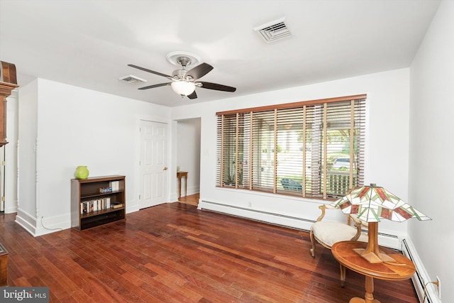 221 Orchard Ave, Burlington, NJ 08016 - living area with visible vents, a baseboard radiator, a ceiling fan, and wood finished floors