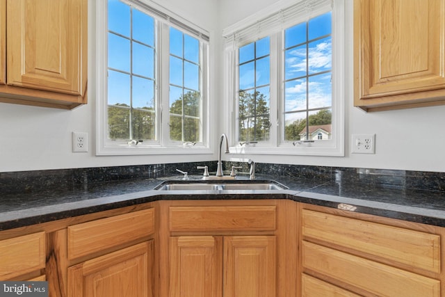 40461 Old Breton Beach Rd, Leonardtown, MD 20650 - kitchen featuring a sink and dark stone counters