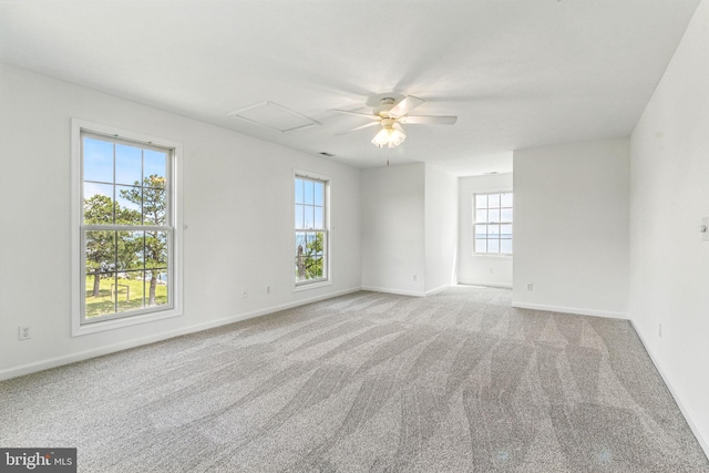 40461 Old Breton Beach Rd, Leonardtown, MD 20650 - carpeted spare room featuring baseboards, a ceiling fan, and attic access