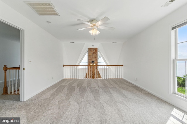 40461 Old Breton Beach Rd, Leonardtown, MD 20650 - carpeted empty room with a ceiling fan, plenty of natural light, baseboards, and fire sprinkler in ceiling