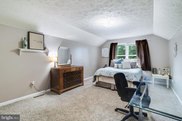 75 NW Dr, Huntingtown, MD 20639 - carpeted bedroom with lofted ceiling, a textured ceiling, baseboards, and a desk