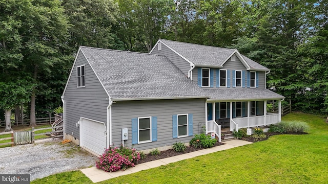 75 NW Dr, Huntingtown, MD 20639 - view of front of property featuring covered porch, a shingled roof, and driveway