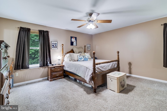 75 NW Dr, Huntingtown, MD 20639 - carpeted bedroom with baseboards and a ceiling fan