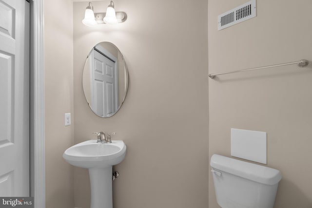 half bathroom with toilet