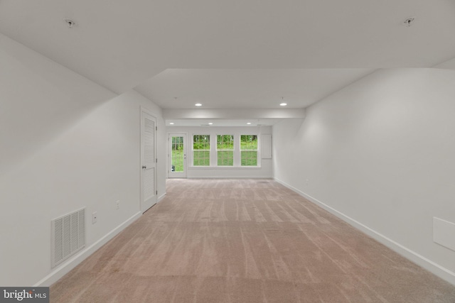 empty room featuring baseboards, recessed lighting, light carpet, and fire sprinkler in ceiling