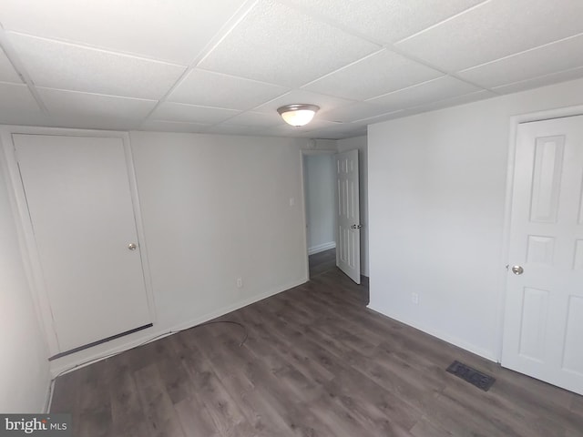 615 Lake St, Lancaster, PA 17603 - below grade area featuring baseboards, a drop ceiling, and wood finished floors