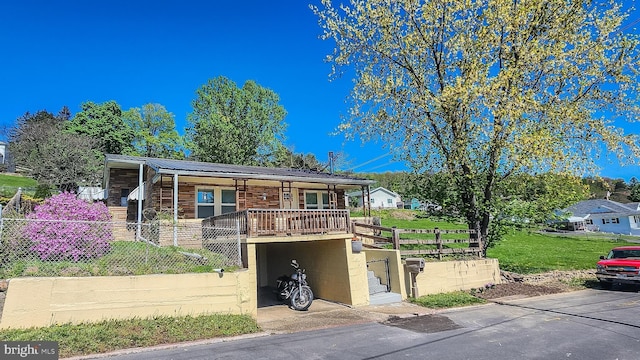 207 Spruce St, Westernport, MD 21562 - view of front facade with a fenced front yard, a front yard, and metal roof