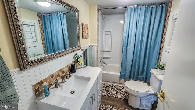 207 Spruce St, Westernport, MD 21562 - full bath featuring shower / tub combo, wainscoting, toilet, and vanity