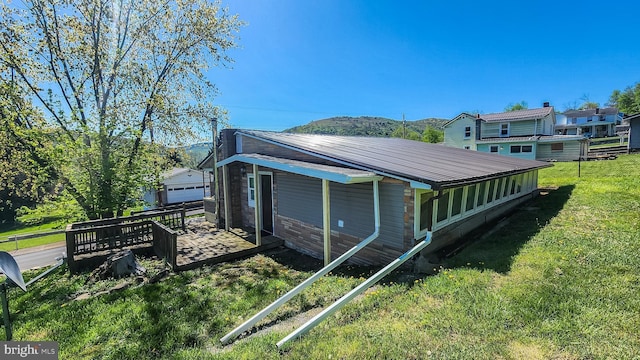 207 Spruce St, Westernport, MD 21562 - view of property exterior featuring a lawn and metal roof