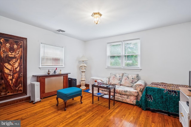 5506 39th Ave, Hyattsville, MD 20781 - living area featuring radiator heating unit and hardwood / wood-style flooring