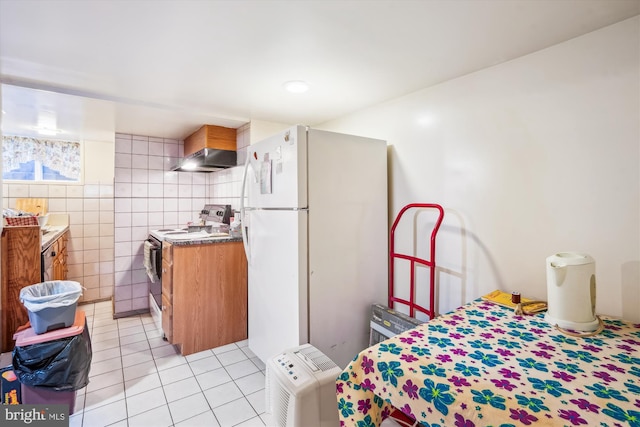 5506 39th Ave, Hyattsville, MD 20781 - bedroom featuring freestanding refrigerator and light tile patterned flooring