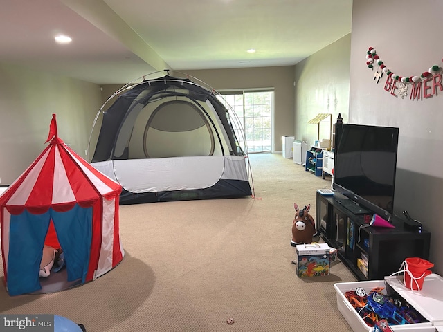 carpeted bedroom featuring recessed lighting