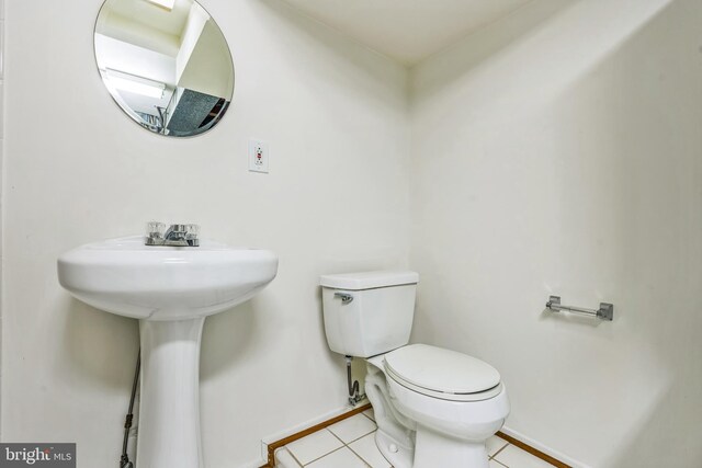 20003 Hob Hill Way, Gaithersburg, MD 20886 - half bathroom with toilet, tile patterned flooring, baseboards, and a sink