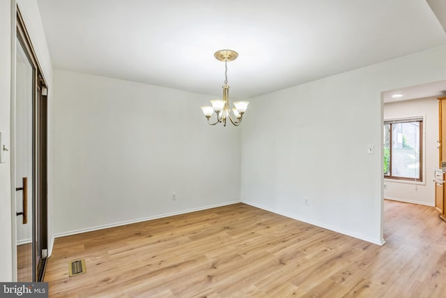 20003 Hob Hill Way, Gaithersburg, MD 20886 - empty room featuring a chandelier, light wood-style floors, and baseboards
