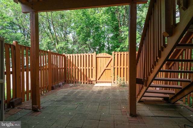view of patio with a gate and a fenced backyard