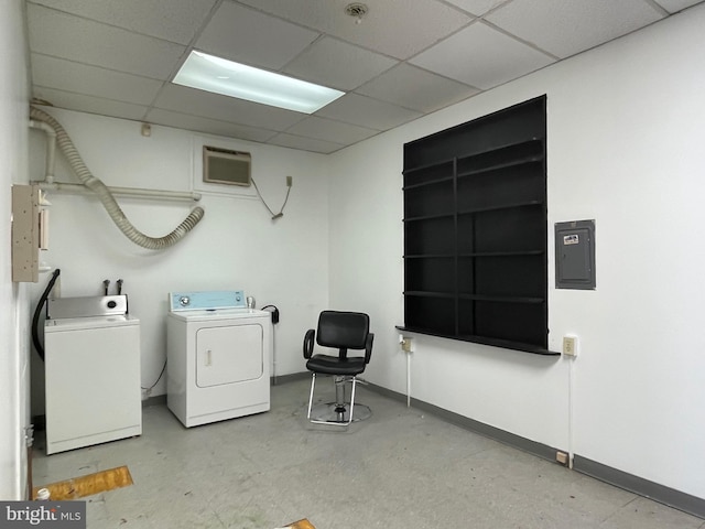 washroom with separate washer and dryer, electric panel, and baseboards