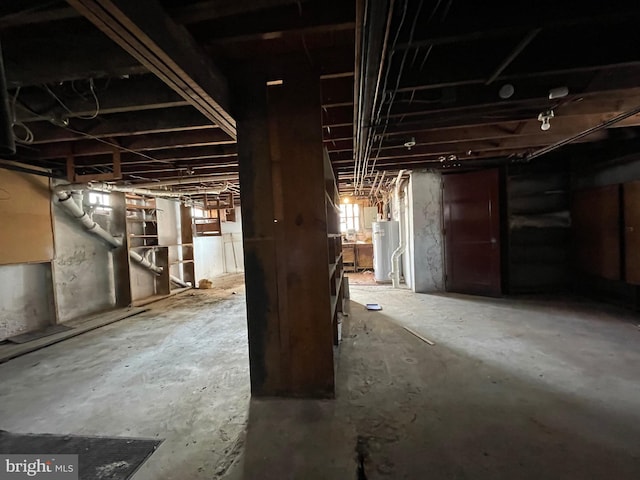 below grade area featuring water heater