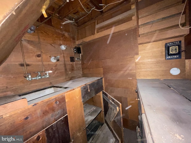 unfinished attic with a sink