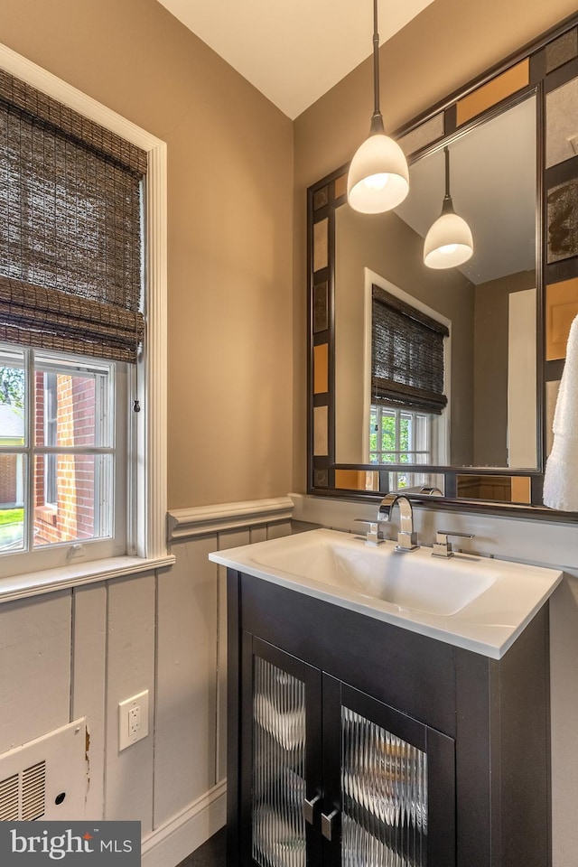 465 Hillcrest Ave, State College, PA 16803 - bathroom featuring vanity and wainscoting