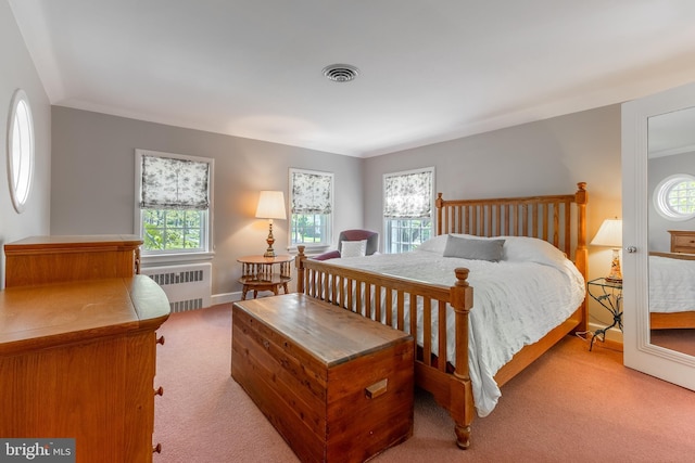 465 Hillcrest Ave, State College, PA 16803 - carpeted bedroom with baseboards, visible vents, and radiator