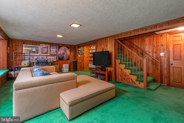 465 Hillcrest Ave, State College, PA 16803 - carpeted living room with wood walls, a textured ceiling, and stairs
