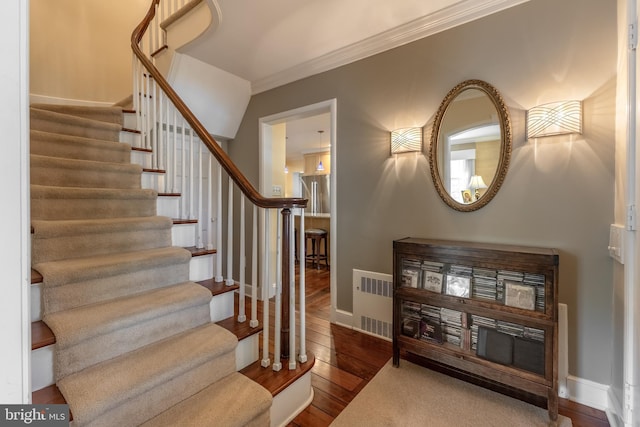 465 Hillcrest Ave, State College, PA 16803 - stairs with visible vents, baseboards, crown molding, and hardwood / wood-style flooring