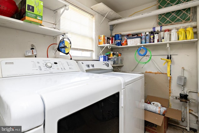 laundry room with laundry area and washer and clothes dryer