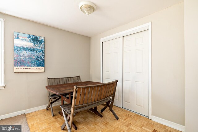 office space featuring baseboards