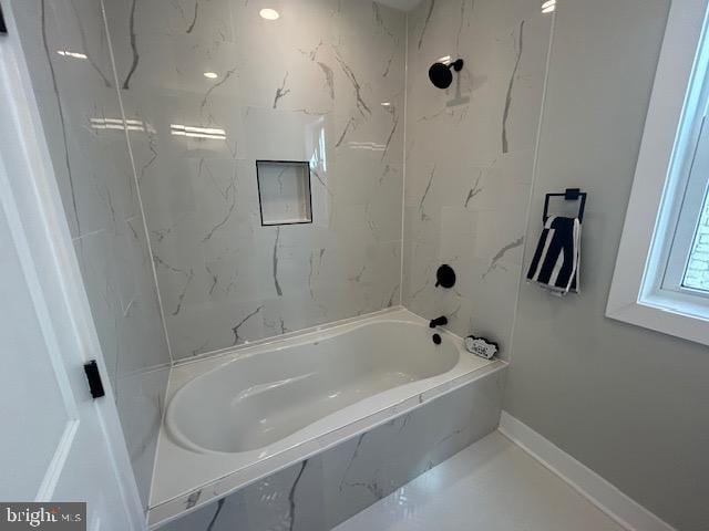 bathroom featuring shower / tub combination