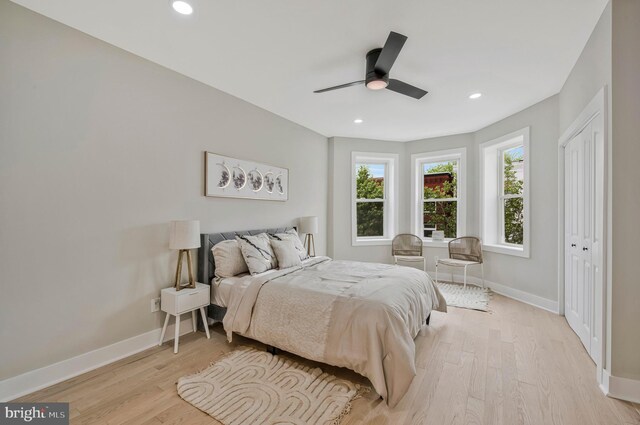 bedroom with recessed lighting, baseboards, a ceiling fan, and light wood finished floors